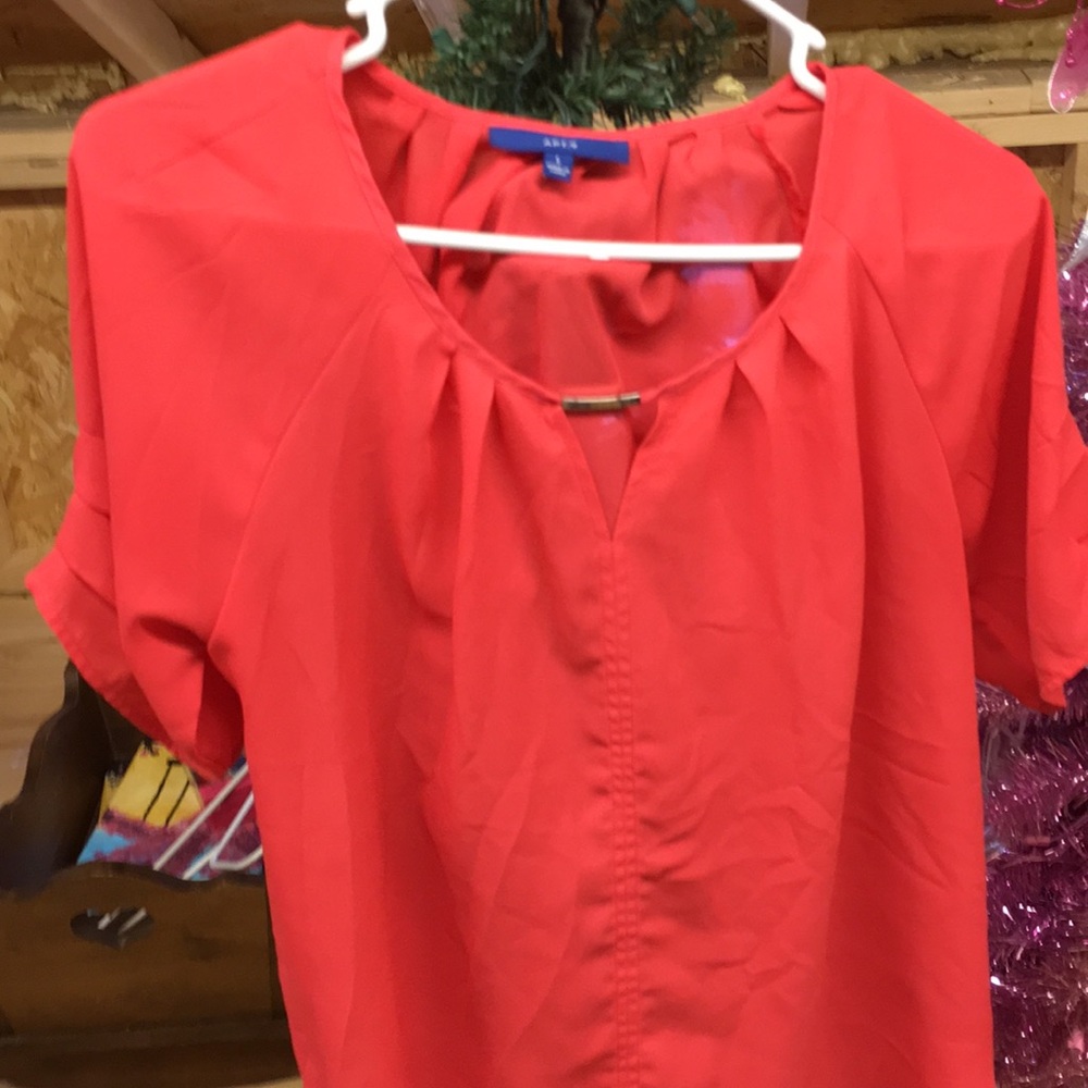 Coral colored blouse